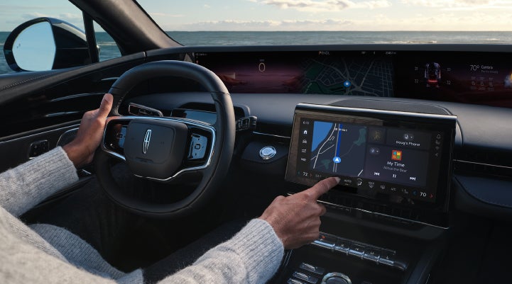 The driver of a 2025 Lincoln Nautilus® SUV interacts with the new Lincoln Digital Experience. | Wallace Lincoln in Fort Pierce FL